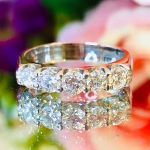 Sold! Royal platinum five stone diamond band